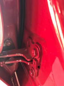 Tesla Model 3 Door Hinges Paint Scraped