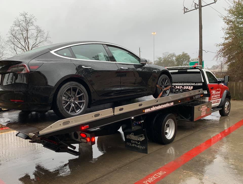 Tesla being towed away